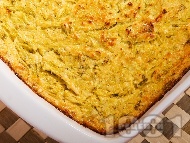 Рецепта Огретен от настъргани / рендосани тиквички със сирене, яйца и грис запечен на фурна